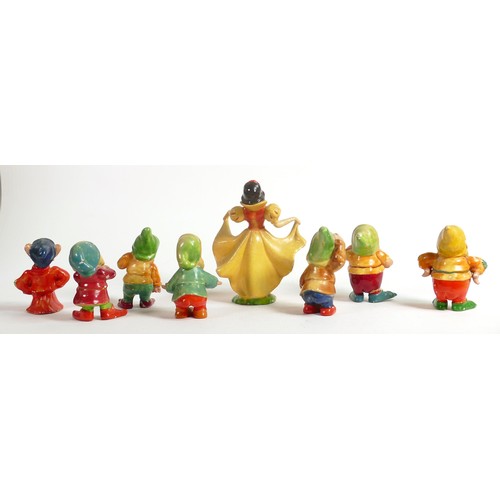 109 - A set of Wade first version Snow White and the Seven Dwarfs, c1930s in cellulose finish, some condit... 