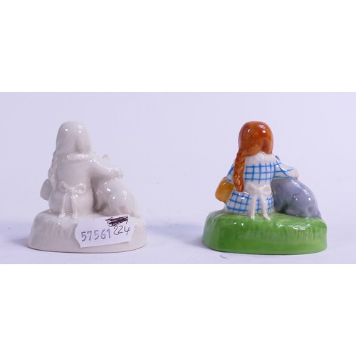 140 - Wade Wizard of Oz Dorothy  figure in two colourways, height 6.5cm. These were removed from the archi... 