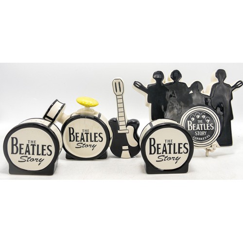 196 - Four Lorna Bailey Beatles Story pieces - Black/White Guitar/Drum tea pot. Mark on base 