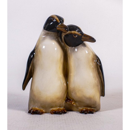 347 - Royal Doulton model of a pair of Penguins HN133,  Height 15.5cm - all over crazing, very tiny chip t... 