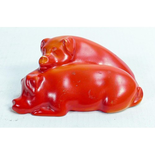 385 - Royal Doulton early pair of snoozing pigs, impressed model no. 62 in red matt glaze, h.4 x L9.5cm. 1... 