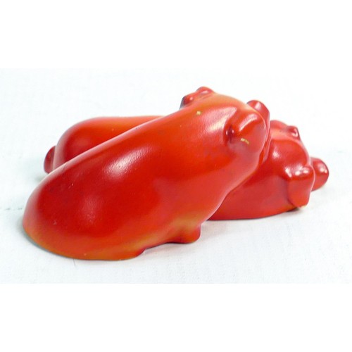 385 - Royal Doulton early pair of snoozing pigs, impressed model no. 62 in red matt glaze, h.4 x L9.5cm. 1... 