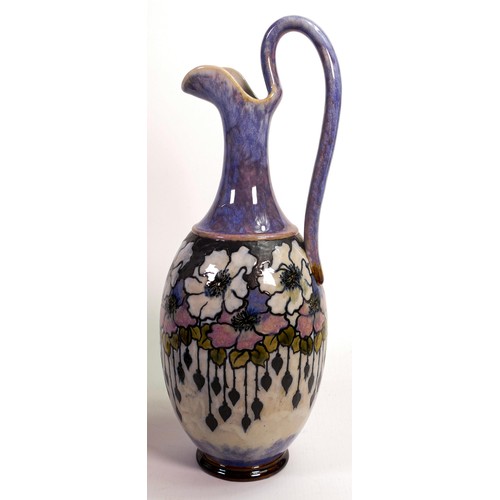 419 - Royal Doulton Lambeth ewer by Eliza Simmance, decorated with stylised leaves and flower heads on a m... 