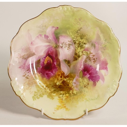 430 - Royal Doulton cabinet plate decorated with Orchids by D Dewsberry, impressed date for 1904, d.23cm.