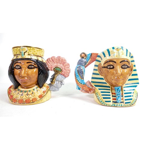 491 - Royal Doulton pair of small character jugs Tutankhamen D7127 and Ankhesenamun D7128. (2)