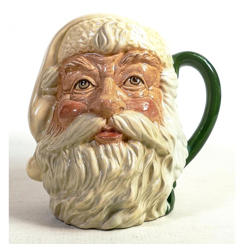 499 - Royal Doulton large character jugs - Santa Claus D6704, in a green colourway (restored) and a unmark... 