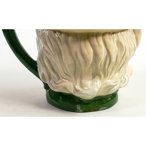 499 - Royal Doulton large character jugs - Santa Claus D6704, in a green colourway (restored) and a unmark... 