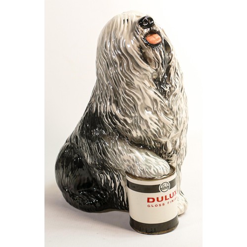 572 - Beswick large fireside Old English Sheepdog with foot on Dulux paint tin, h.32cm. Slight piece re-st... 