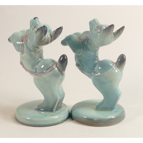 587 - Beswick blue gloss model of a character dog begging & similar with pink highlights. (2)