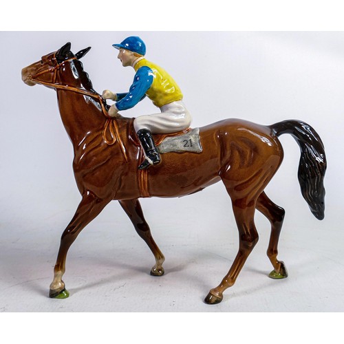 633 - Beswick jockey on walking horse 1037, yellow, white & blue jockey colours.