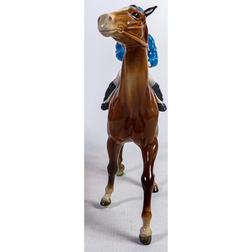 633 - Beswick jockey on walking horse 1037, yellow, white & blue jockey colours.