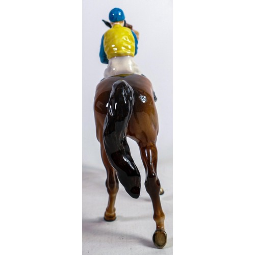 633 - Beswick jockey on walking horse 1037, yellow, white & blue jockey colours.