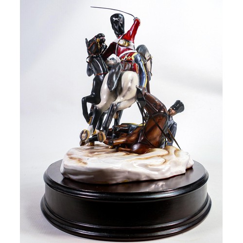 690 - A Michael Sutty limited edition porcelain military group 