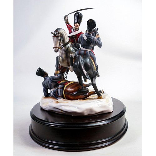 690 - A Michael Sutty limited edition porcelain military group 