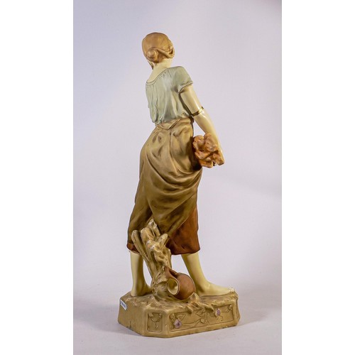 693 - Royal Dux large figure of a farm girl with hay, impressed Rachele to the rear, h 55cm. 2.5cm glaze f... 