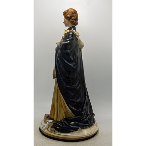 704 - Large Capodimonte figure of the Queen in royal robes, height 39cm.