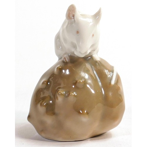 712 - Royal Copenhagen mouse on a currant bun figure, height 6.5cm.