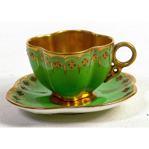 850 - Coalport miniature coffee cup & saucer, green ground with gilded interior of cup and gilded decorati... 