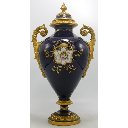 865 - Coalport large two handled gilded vase with panel of Ullswater landscape, - finial re-stuck with chi... 