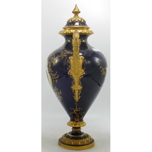 865 - Coalport large two handled gilded vase with panel of Ullswater landscape, - finial re-stuck with chi... 