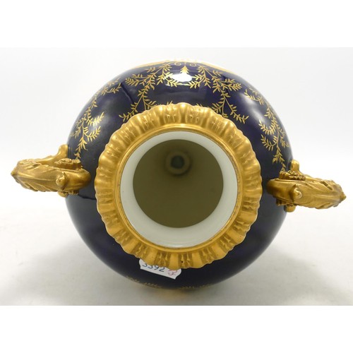 865 - Coalport large two handled gilded vase with panel of Ullswater landscape, - finial re-stuck with chi... 