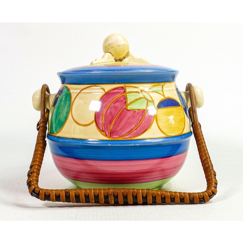 868 - Clarice Cliff Newport pottery Fantasque biscuit barrel in the Melons design, original wicker handle,... 