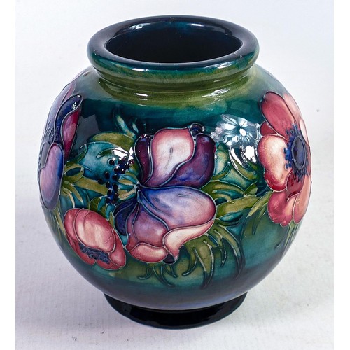 893 - Moorcroft Anemone bulbous vase on hazed green blue ground, , production faults and scuffing to upper... 