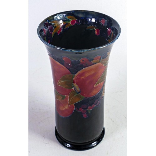 894 - Large Moorcroft Pomegranate on blue ground vase, chip to outer top rim - height 26cm