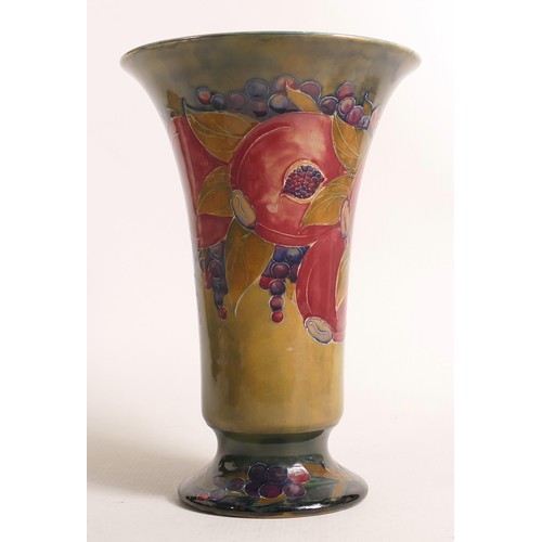 917 - Early William Moorcroft Pomegranate flared vase on ochre ground. Professional restoration to top rim... 