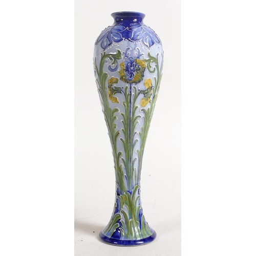 920 - William Moorcroft MacIntyre & Co. Florian ware vase. Height 22.5cm - top rim restored and firing cra... 