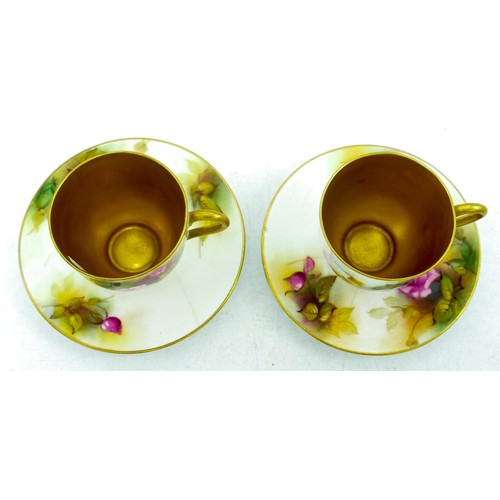 930 - Pair of Royal Worcester small cups and saucers hand painted with roses by M Hunt, puce marks, Hairli... 