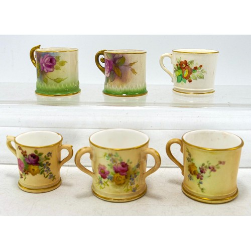 932 - A collection of Royal Worcester hand painted miniature loving cups, decorated with various flowers, ... 