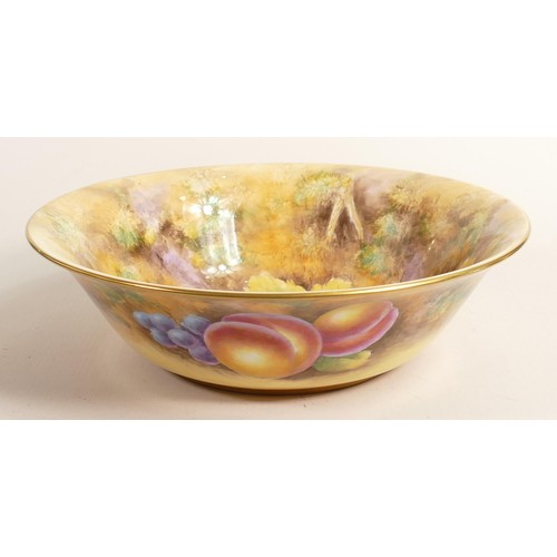 957 - Royal Worcester large fruit bowl hand painted with fruit by Jones, black factory marks, d.25.5cm.