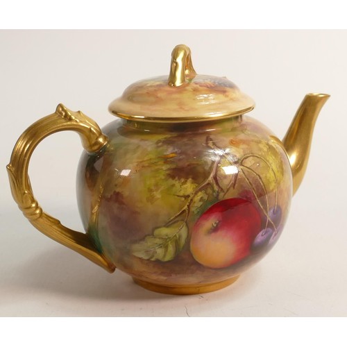 986 - Royal Worcester tea pot, gilded and hand painted with fruit by E Townsend, puce mark, h.15cm.