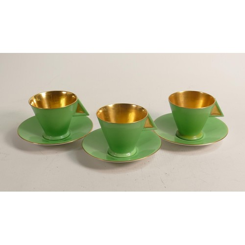 1009 - Shelley Vogue shape coffee cups & saucers x 3, patt no. 11754/4. 1 cup with hairline. (6)