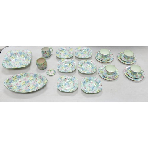 1032 - Shelley Melody patterned 22 piece tea set including trios, fruit bowl, open veg dish, dessert bowls ... 