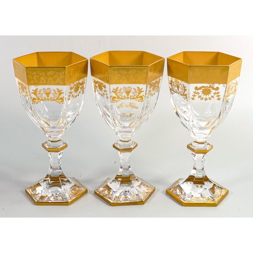 1228 - De Lamerie Fine Bone China Versailles patterned heavily gilded wine glasses, one with Al Nahyuan per... 