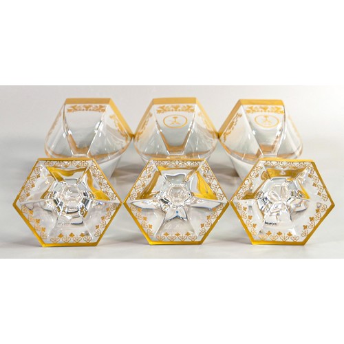 1229 - De Lamerie Fine Bone China Versailles patterned heavily gilded wine glasses with Bahrain motif, spec... 