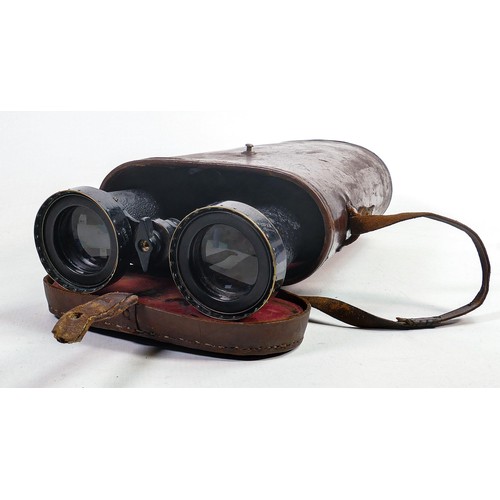 1574 - WWII era Barr & Stroud 7x naval Binoculars, sea spray covers fitted, in leather case.