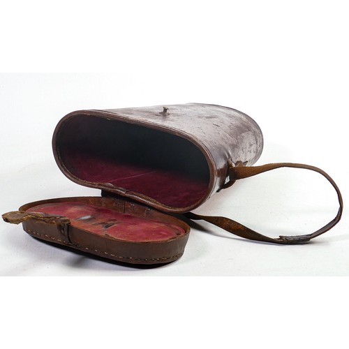 1574 - WWII era Barr & Stroud 7x naval Binoculars, sea spray covers fitted, in leather case.