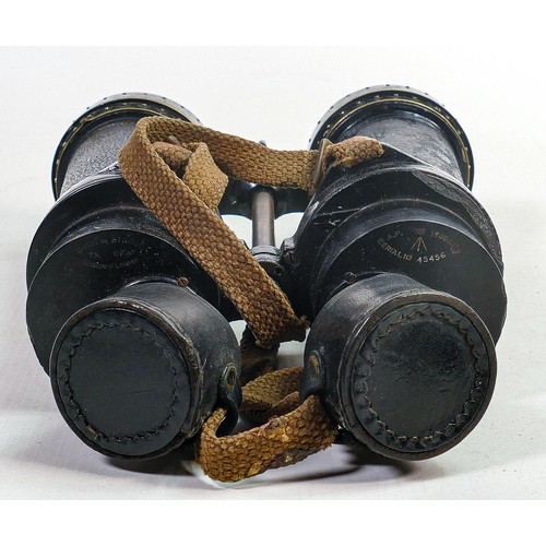 1574 - WWII era Barr & Stroud 7x naval Binoculars, sea spray covers fitted, in leather case.