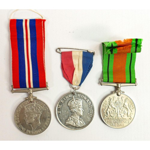 1580 - A group of second world war WWII medals and paperwork relating to Harry Bennett (1892-1979) to inclu... 