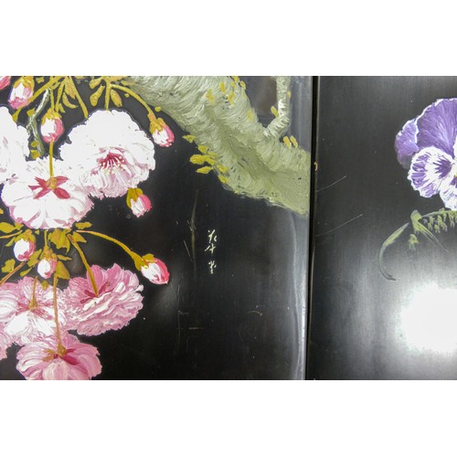 1719 - Two painted Oriental lacquered wood panels, both decorated with flowers, 61 x 27cm. (2)