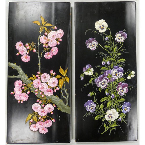 1719 - Two painted Oriental lacquered wood panels, both decorated with flowers, 61 x 27cm. (2)