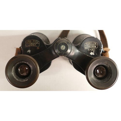 1653 - A pair of cased Zeiss Jena turolem binoculars - some pushed in areas around eyepiece.