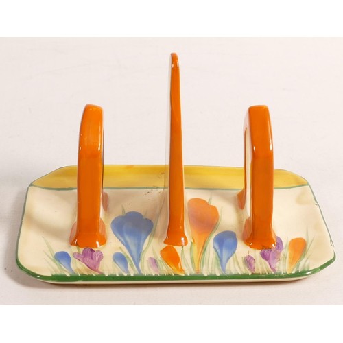 874 - Clarice Cliff Newport pottery toast rack in the Crocus design, 12.5 x 8.5cm, tiny factory firing fau... 