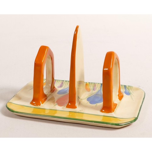 874 - Clarice Cliff Newport pottery toast rack in the Crocus design, 12.5 x 8.5cm, tiny factory firing fau... 