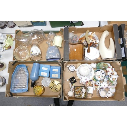 11 - A mixed collection of items to include decorative china, wade whimsies, figures, miniture tea set et... 