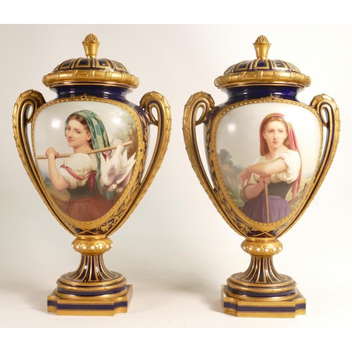 928 - A pair of Royal Worcester vase and covers,
dated 1871, each decorated with farm girls on gilded coba... 