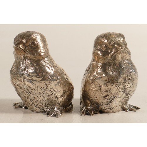 1659 - A Silver novelty cruet set as chicks, hallmarked for London 1974 by Edward Barnard & Sons Ltd., 286g... 